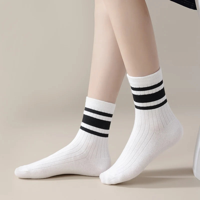 Four Pairs of Children's Socks for Spring and Autumn, Striped Versatile Style, Mid-Calf Socks with a School Style.